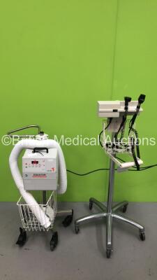 1 x Smiths Medical Level 1 EQ-5000 Equator COnvective Warmer on Stand with Hose (Powers Up - Damage to Hose - See Pictures) and 1 x Welch Allyn Otoscope / Ophthalmoscope Set with 2 x Handpieces and 2 x Heads (Powers Up - 1 x Damaged - See Pictures)