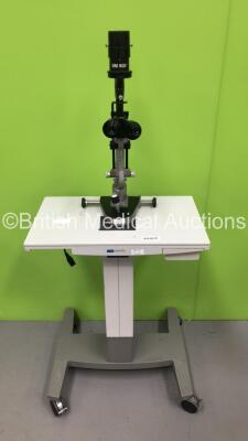 Haag Streit Bern BM 900 Slit Lamp with Binoculars and 2 x 10x Eyepieces on Hydraulic Table (Unable to Power Up Due to No Power Supply or Bulb - Not Secured to Table - See Pictures) **Mfd 2004**
