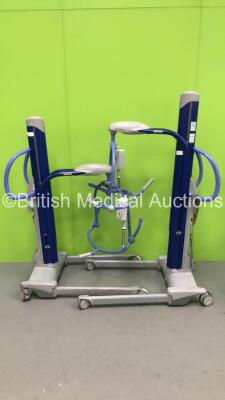 2 x Arjo Maxi Move Electric Patient Hoists with Controllers (Not Power Tested Due to No Batteries)