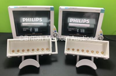 2 x Philips IntelliVue MP70 Neonatal Touch Screen Patient Monitors Software Revision J.10.45 (Both Power Up) with 2 x Philips M8048A Module Racks *W*