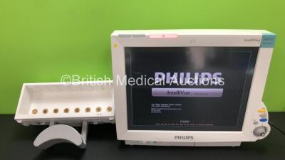 Philips IntelliVue MP70 Neonatal Touch Screen Patient Monitor Software Revision J.10.45 (Powers Up, Missing Button and Slight Damage to Casing - See Photos) with 1 x Module Rack *W*
