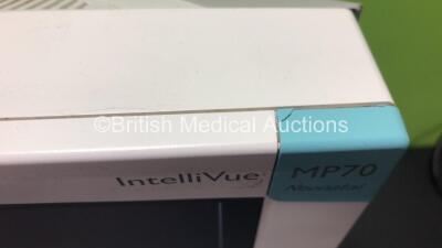 Philips IntelliVue MP70 Neonatal Touch Screen Patient Monitor Software Revision J.10.45 (Powers Up, Missing Button and Slight Damage to Casing - See Photos) with 1 x Module Rack *W* - 5