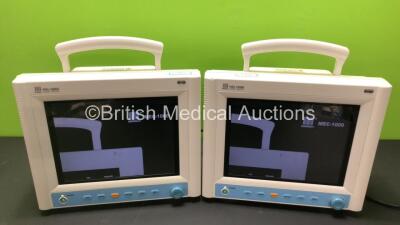 2 x Mindray MEC-1000 Patient Monitors Including ECG, NIBP, SpO2 and T1 Options (Both Power Up, Both with Slight Damage to Casing - See Photos) *AQ72B13176 / AAQ73B13960*
