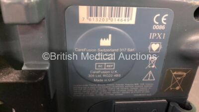 Job Lot Including 29 x Alaris SE Pumps (8 in Photo - 29 in Total) and 1 x CareFusion Alaris GS Syringe Pump (Powers Up, Requires Service) *713106762 / 713106763 / 135107812 / 135107763 / 713106764 / 135107805 / 135107810 / 713100930 / 135107743 / 80011602 - 5