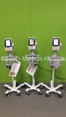 3 x Welch Allyn SPOT Vital Signs LXi Vital Signs Monitors on Stands (All Power Up) *S/N 20140301796 / 20121007501*