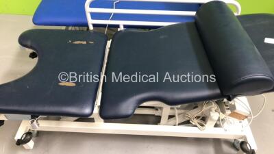 1 x Arjo Huntleigh Akron Hydraulic Patient Couch and 1 x Bristol Maid Hydraulic Patient Couch - 2
