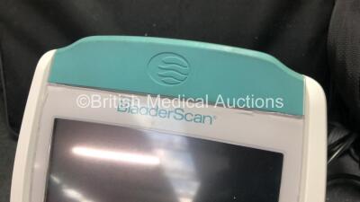 2 x Verathon BVI 9400 Bladder Scanners with 2 x Transducer / Probes,1 x User Manual,2 x Batteries and 1 x Battery Charger in Carry Bags (Both Power Up with Damage-See Photos) *SN B4003905, B4003897* - 4