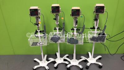 4 x CSI Criticare SPO2/Comfort Cuff 506DXN Vital Signs Monitors on Stands (All Power Up)