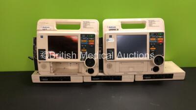 Job Lot Including 1 x Medtronic Physio Control Lifepak 12 12-Lead Biphasic Defibrillator / Monitor with CO2, SPO2, NIBP and ECG Options (Damaged Casing and Missing Printer), 1 x Medtronic Physio Control Lifepak 12 12-Lead Biphasic Defibrillator / Monitor 