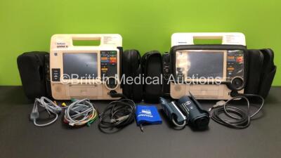 2 x Medtronic Physio-Control Lifepak 12 12-Lead Biphasic Defibrillators / Monitors with CO2, SPO2, NIBP, ECG and Printer Options, 2 x Paddle Leads, 1 x 4 Lead ECG Lead, 1 x 6 Lead ECG Lead and 3 x BP Cuffs (Both Untested Due to No Batteries)