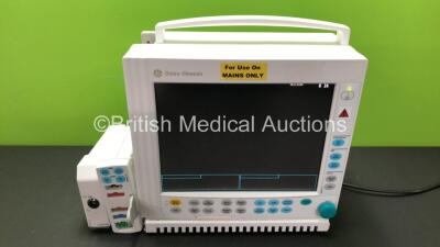 GE Datex Ohmeda Type F-CM1-04 Patient Monitor with 1 x GE M1054424 Interface Module and 1 x GE E-PSMP-01 Module *Mfd 2013* Including ECG, SpO2, NIBP, T1, T2, P1 and P2 Options (Powers Up with Slight Damage to Casing - See Photos)