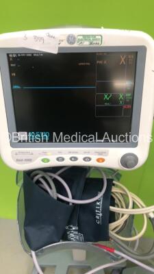 1 x Datascope Tiro Patent Monitor on Stand, 1 x GE Dinamap ProCare Auscultatory 300 Vital Signs Monitor on Stand and 1 x GE Dash 4000 Patient Monitor on Stand with BP 1/3, BP 2/4, SPO2, Temp/Co / NBP and ECG Options (All Power Up) *S/N FS0093263 / 000834 - 2