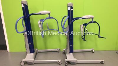 2 x Arjo MaxiMove Electric Patient Hoists with 1 x Battery and 2 x Controller (Both Power Up - 1 x Battery Included)