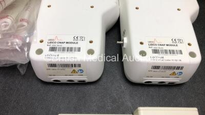 Mixed Lot Including 1 x Varioscope M500 Magnification System with Footswitch (Powers Up) 1 x Masimo Radical 7 Signal Extraction Pulse CO Oximeter (No Power) 2 x LiDCO CNAP Modules, 1 x LiDCO BP Module, 2 x LiDCO CNAP Cuff Controllers and 7 x GE Critikon L - 7