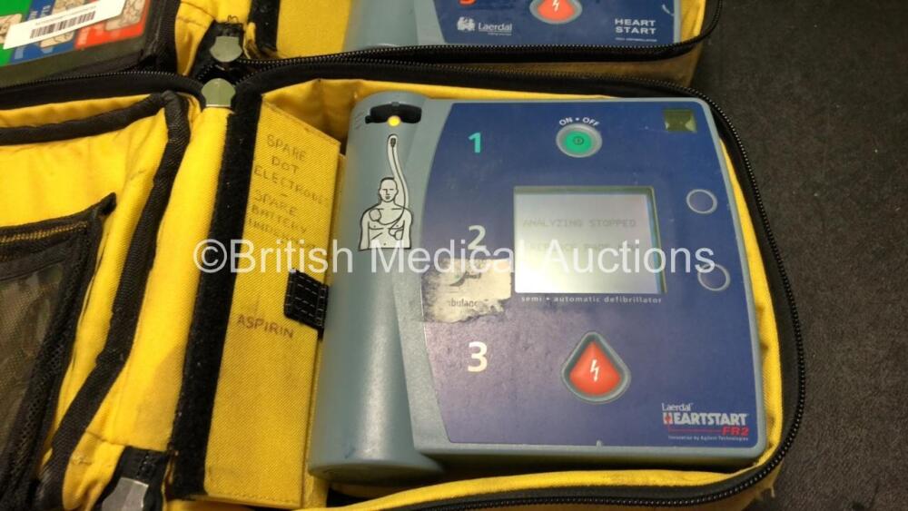 1 x Laerdal Heartstart FR2 Defibrillator and 1 x Laerdal Heartstart FR2