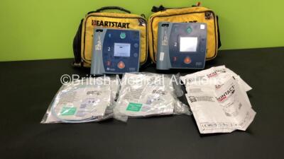 Job Lot Including 1 x Laerdal HeartStart FR2+ Defibrillator and 1 x Philips HeartStart FR2+ Defibrillator with 2 x Batteries (Install Dates - 02/2022 and 09/2025) 4 x Skintact DF27NC Electrodes (Expiry Dates - 2 x 2023 and 2 x 2022) and 3 x Skintact ECG E