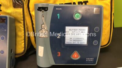 Job Lot Including 1 x Laerdal HeartStart FR2+ Defibrillator and 1 x Philips HeartStart FR2+ Defibrillator with 2 x Batteries (Install Dates - 02/2022 and 09/2025) 4 x Skintact DF27NC Electrodes (Expiry Dates - 2 x 2023 and 2 x 2022) and 3 x Skintact ECG E - 2