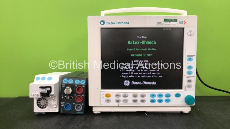 GE Datex Ohmeda Compact Anesthesia Monitor *05-2011* with 1 x GE E-CAiOV Module Including Spirometry Options and D fend Water Trap, 1 x GE E-NESTPR Module Including ECG, SpO2, NIBP, T1-T2 and P1-P2 Options (Powers Up with Damage-See Photos)