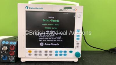 GE Datex Ohmeda Compact Anesthesia Monitor *05-2011* with 1 x GE E-CAiOV Module Including Spirometry Options and D fend Water Trap, 1 x GE E-NESTPR Module Including ECG, SpO2, NIBP, T1-T2 and P1-P2 Options (Powers Up with Damage-See Photos) - 2