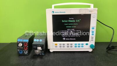 GE Datex Ohmeda S/5 Compact Anesthesia Monitor with 1 x GE E-CAiOV Module Including Spirometry Options and D fend Water Trap, 1 x GE E-NESTPR Module Including ECG, SpO2, NIBP, T1-T2 and P1-P2 Options (Powers Up)