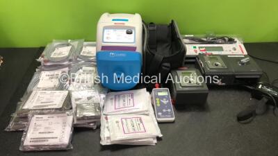 Mixed Lot Including 1 x ConMed AER Defense Smoke Evacuation Unit (Powers Up) 1 x Cardinal Health IVAC PCAM Pump (No Power) 2 x Philips REMstar Auto A Flex CPAP Units with 1 x Philips System One Humidifier Unit and 1 x AC Power Supply (Both Power Up with M