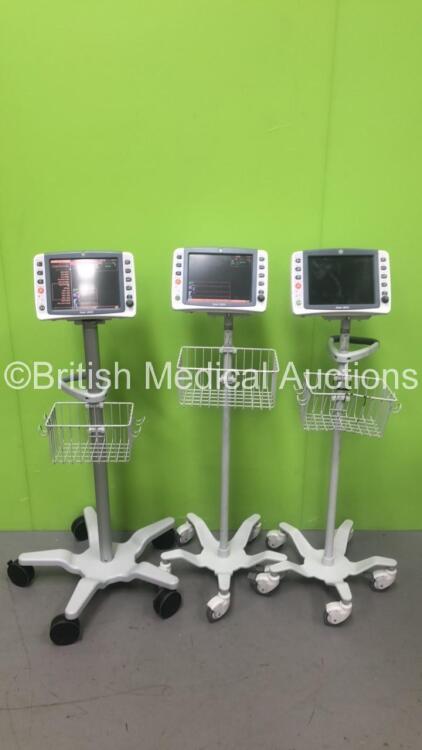 3 x GE Dash 2500 Patient Monitors Including ECG, SpO2 and NIBP Options on Stands *Mfd 2014 / 2014 /2009* (2 x Power Up, 1 x No Power) *SCG09067915WA / SCG14040058WA / SCG14040057WA*