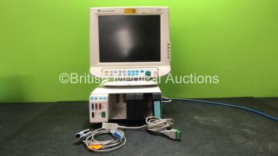 Datex Ohmeda S/5 Monitor with 1 x GE E-PRESTN-00 Module Including ECG, NIBP, SpO2, T1, T2, P1 and P2 Options, 3 x Blank Modules, 1 x Datex Ohmeda F-CU8-10 Module Rack, 1 x ECG Trunk Cable and 1 x SpO2 Finger Sensor (Powers Up) *SN 5197710*