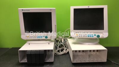 2 x Datex Ohmeda S/5 Patient Monitors with 2 x GE F-CU812-VG1 Module Racks (Both Power Up)