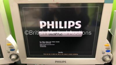 2 x Philips IntelliVue MP70 Patient Monitors and 1 x Philips IntelliVue MP70 Anesthesia Patient Monitor (All Power Up - 2 x Damaged Casing, See Photos) - 4