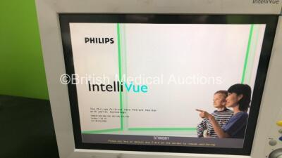 2 x Philips IntelliVue MP70 Patient Monitors and 1 x Philips IntelliVue MP70 Anesthesia Patient Monitor (All Power Up - 2 x Damaged Casing, See Photos) - 5