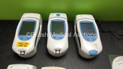 Job Lot Including 3 x Roche Coaguchek XS Plus Blood Monitoring Units with 5 x Handheld Base Units, 1 x AC Power Supply and 1 x Spare Battery Cover (All Power Up) *SN UU00012939, UU000109276, UU00024240, UU00032769, UU00031801, - 2