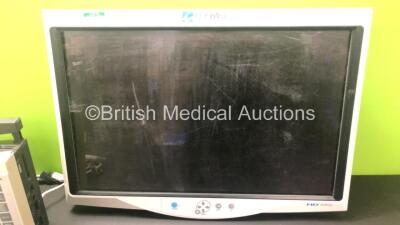 Mixed Lot Including 1 x Siemens SC7000 Patient Monitor with ECG Lead and Power Supply (Powers Up) 1 x ConMed 26 Inch HD 1080p Monitor (Untested Due to No Power Supply) and 1 x Oxylitre Victor-Vac Suction Unit with 2 x Cups and Hoses (Powers Up, 1 x Missin - 4