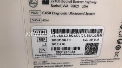 Philips CX50 Portable Ultrasound Scanner Ref 989605384711 *S/N SGD1209308* **Mfd 2012** Revision 3.0.1 with 2 x Transducers / Probes (S5-1 and D2cwc) on Philips CX Cart (Powers Up - Missing Rubber from Wheels) - 8