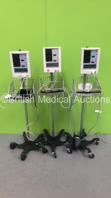 3 x Datascope Accutorr Plus Vital Signs Monitors on Stands with SPO2 Finger Sensors and BP Hoses (All Power Up) *S/N A731231-H3 / A714255-G0 / A726662-K2*