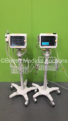 2 x Philips SureSigns VM4 Patient Monitors with ECG,SpO2 and NIBP Options on Stands with 2 x ECG Leads and 2 x BP Hoses (Both Power Up)