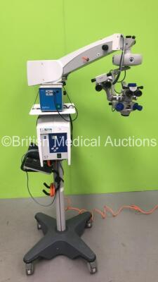 Zeiss OPMI VISU 150 Dual Operated Surgical Microscope with 2 x f170 Binoculars, 2 x Zeiss 12,5x Eyepieces, 2 x 10x/22B Eyepieces, Zeiss f200 APO Lens, Zeiss MediLive 3,8 Camera Control Unit on Zeiss S7 Stand (Powers Up with Good Bulb - Trim Damaged to Rea