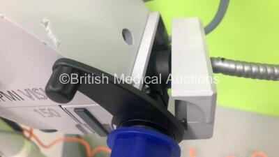 Zeiss OPMI VISU 150 Dual Operated Surgical Microscope with 2 x f170 Binoculars, 2 x Zeiss 12,5x Eyepieces, 2 x 10x/22B Eyepieces, Zeiss f200 APO Lens, Zeiss MediLive 3,8 Camera Control Unit on Zeiss S7 Stand (Powers Up with Good Bulb - Trim Damaged to Rea - 8