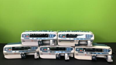 Job Lot Including 4 x CareFusion Alaris GH Syringe Pumps and 1 x Cardinal Health Alaris GH Syringe Pump (All Power Up, 1 x Does Not Charge, 2 x Damage to Casing - See Photos)