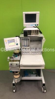 Datex-Ohmeda Aestiva/5 Induction Anaesthesia Machine with Datex-Ohmeda 7100 Ventilator Software Version 1.4, Datex-Ohmeda S/5 Monitor, Datex-Ohmeda Module Rack, Bellows, Absorber and Hoses (Powers Up) *S/N AMVJ00548*