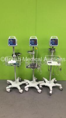 3 x CSI Criticare Comfort Cuff 506N3 Series VItal Signs Monitors on Stands with Selection of Leads (All Power Up) *S/N 211255877 / 306605093 / 109244975*