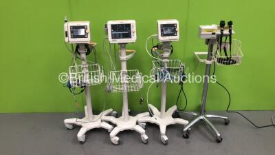 2 x Philips SureSigns VS2 Patient Monitors on Stands, 1 x Philips SureSigns VS3 Patient Monitor on Stand and 1 x Welch Allyn Otoscope / Ophthalmoscope Set on Stand with 2 x Handpieces and 2 x Heads (All Power Up) *S/N US90300325 / US93801155*