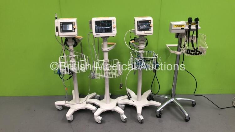 2 x Philips SureSigns VS2 Patient Monitors on Stands, 1 x Philips SureSigns VS3 Patient Monitor on Stand and 1 x Welch Allyn Otoscope / Ophthalmoscope Set on Stand with 2 x Handpieces and 2 x Heads (All Power Up) *S/N US90300325 / US93801155*