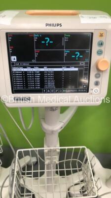 2 x Philips SureSigns VS2 Patient Monitors on Stands, 1 x Philips SureSigns VS3 Patient Monitor on Stand and 1 x Welch Allyn Otoscope / Ophthalmoscope Set on Stand with 2 x Handpieces and 2 x Heads (All Power Up) *S/N US90300325 / US93801155* - 3