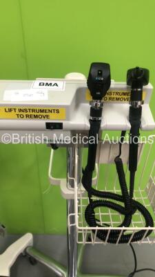 2 x Philips SureSigns VS2 Patient Monitors on Stands, 1 x Philips SureSigns VS3 Patient Monitor on Stand and 1 x Welch Allyn Otoscope / Ophthalmoscope Set on Stand with 2 x Handpieces and 2 x Heads (All Power Up) *S/N US90300325 / US93801155* - 5