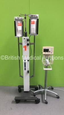 1 x Welch Allyn 52000 Series Patient Monitor on Stand (No Power Supply) and 1 x Smiths Medical System 1000 Level 1 Fluid Warming System (Powers Up) *S/N 9702028*