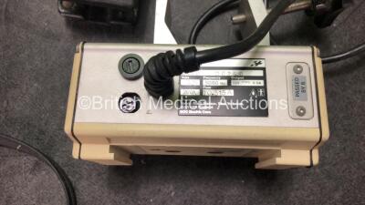 Mixed Lot Including 1 x Ambu Uni Suction Footswitch, 1 x Richard Wolf Foot Pedal, 1 x AND TM 2020 Processor with Bp Cuff (Untested Due to Possible Flat Batteries) 1 x 001829E Battery *Untested* 1 x Boston Scientific Latitude Communicator Unit, 1 x Ohmeda - 5