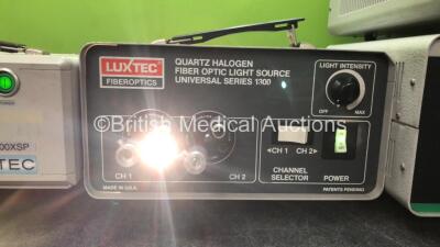 Mixed Lot Including 1 x Luxtec 9300XSP Light Source, 1 x Luxtec Universal Series 1300 Fiber Optic Light Source and 2 x Megadyne Mega VAC Plus Smoke Evacuator Units (Both Power Up) *SN 0601089, 030507, 12681, 12699* - 3