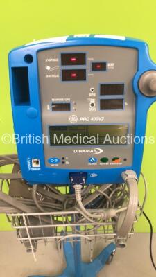 4 x GE Dinamap Pro 400V2 Vital Signs Monitors on Stands with a Selection of Leads (All Power Up) *S/N AAX08100167SA / AAX04460105SA / AAX05100139SA / AAX08100213SA* - 4