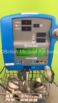 4 x GE Dinamap Pro 300V2 Vital Signs Monitors on Stands with a Selection of Leads (All Power Up) *S/N AAX04160010SA / 033M3389024 / AAX06230057SA / AAX04160080SA - 5