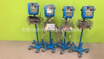 3 x GE Dinamap Pro 300V2 and 1 x Pro 300 Vital Signs Monitors on Stands with a Selection of Leads (All Power Up with 1 x Damaged Screen - See Photo) *S/N 032M0279114 / 033M3319007 / AAX08070032SA / 032M0519020